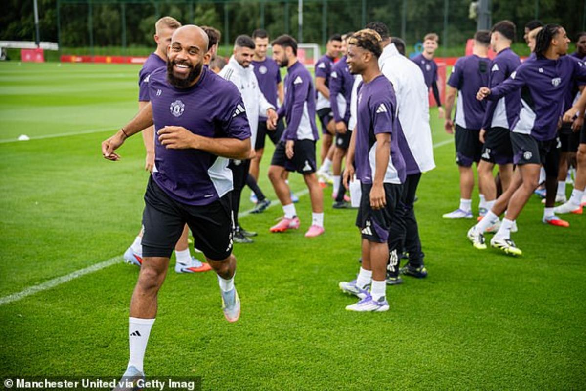 Mbeumo was all smiles as he took part in his first drills at United's Carrington training ground
